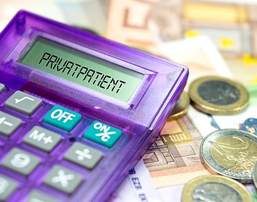 Taschenrechner mit der Aufschrift "Privatpatient"