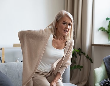 Osteoporose Frau mit Schmerzen